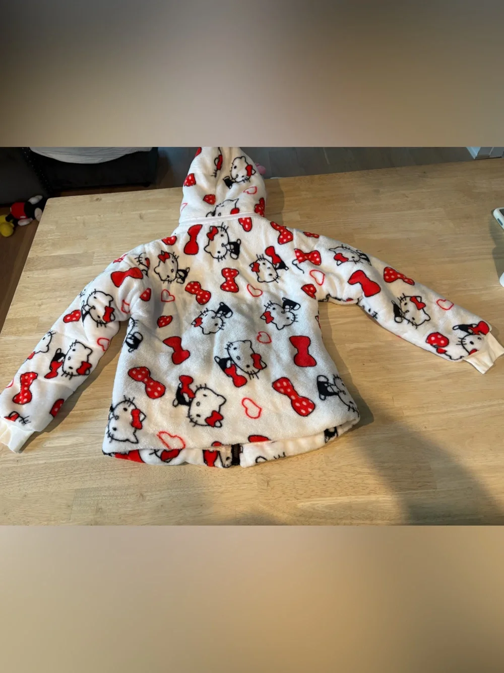 Hello Kitty White Plush Zip-Up Hoodie with Red Accents and Pink Fur Hood Trim